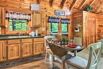 Romantic Gatlinburg Studio Cabin with Hot Tub and Deck - image 11