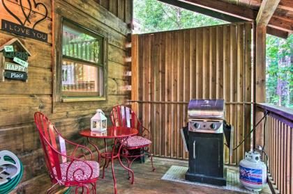 Romantic Gatlinburg Studio Cabin with Hot Tub and Deck - image 12