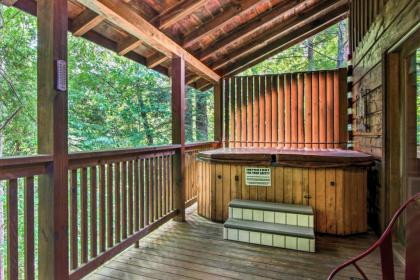 Romantic Gatlinburg Studio Cabin with Hot Tub and Deck - image 14