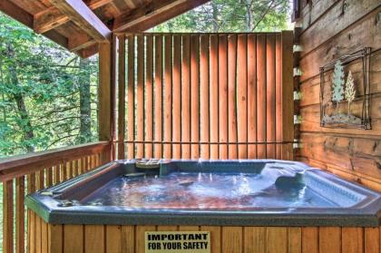 Romantic Gatlinburg Studio Cabin with Hot Tub and Deck - image 18