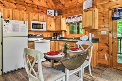 Romantic Gatlinburg Studio Cabin with Hot Tub and Deck - image 7