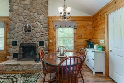 Greenbrier Woods Log Cabin with Hot Tub Stone Wood Fireplace Covered Deck and Close to Gatlinburg - image 11