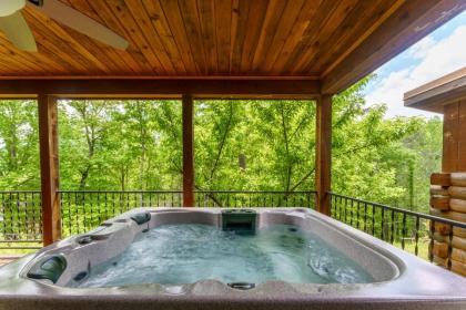 Greenbrier Woods Log Cabin with Hot Tub Stone Wood Fireplace Covered Deck and Close to Gatlinburg - image 2