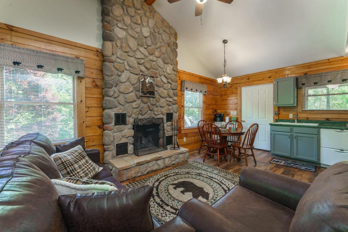 Greenbrier Woods Log Cabin with Hot Tub Stone Wood Fireplace Covered Deck and Close to Gatlinburg - image 3