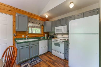 Greenbrier Woods Log Cabin with Hot Tub Stone Wood Fireplace Covered Deck and Close to Gatlinburg - image 9