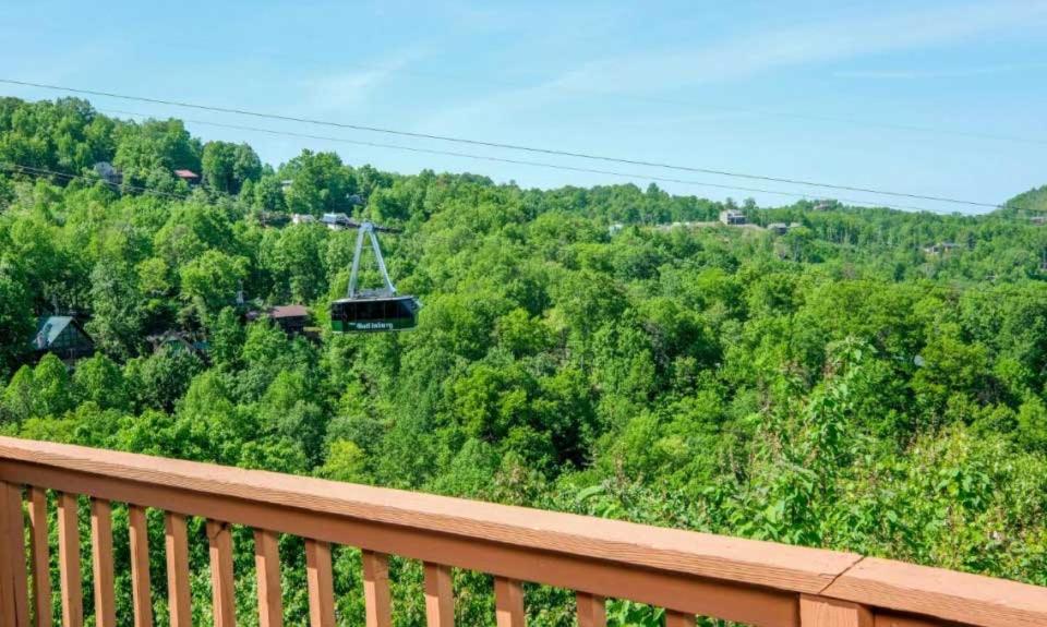 A Tram View Scenic Mountain Views and see the Gatlinburg historic cable tram pass by - main image